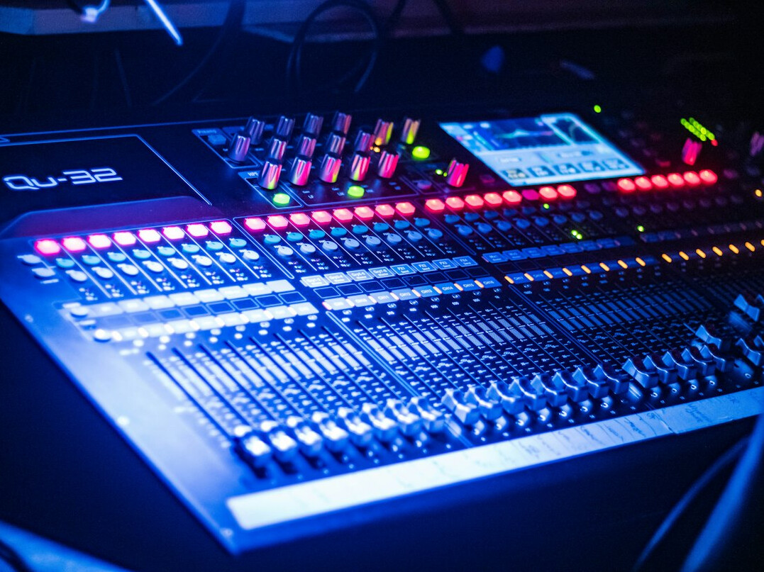 audio mixing console in studio